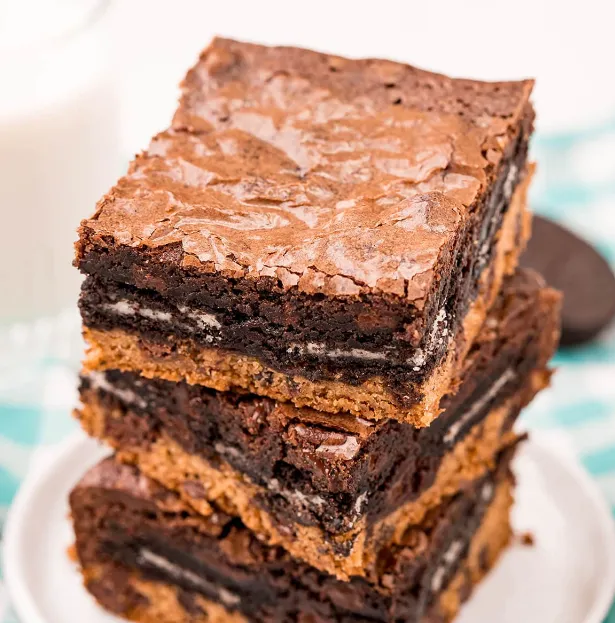 Deliciously layered slutty brownies with cookie and Oreo layers