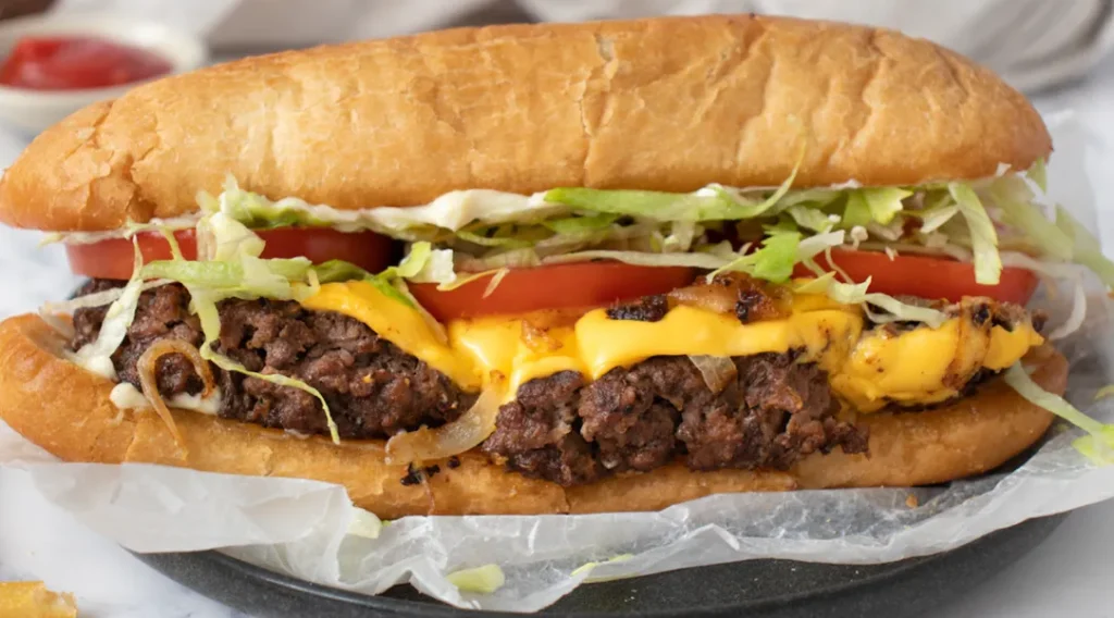 Delicious homemade chopped cheese sandwich on a plate