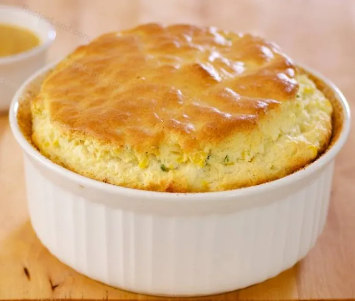 Golden-brown Corn Soufflé in a baking dish