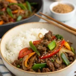 Spicy Ground Beef Stir-Fry Bowl with Garlic Veggies & Steamy Rice