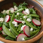 Sugar Snap Pea Salad with Radishes Feta and Arugula
